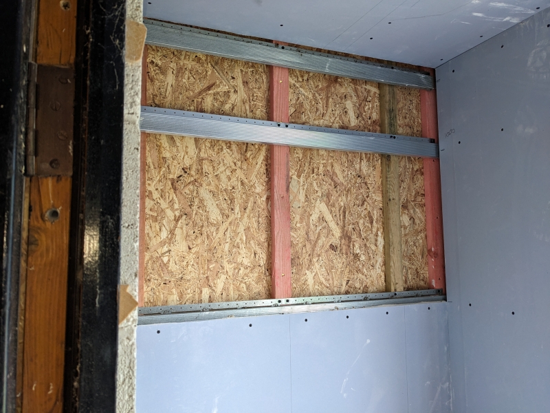 Interior view showing plasterboard over resilient bar.